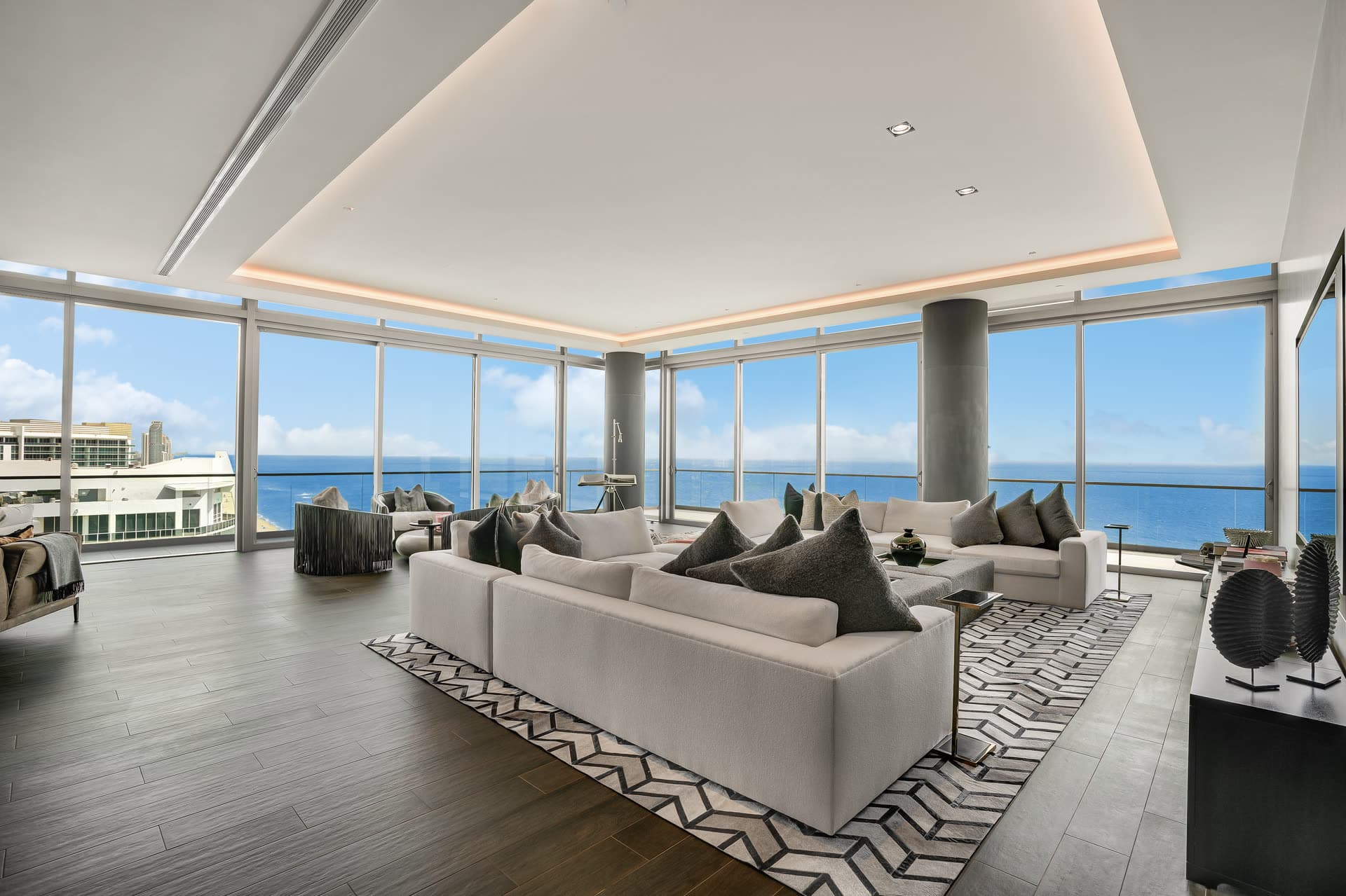 Two-story penthouse living room with ocean views